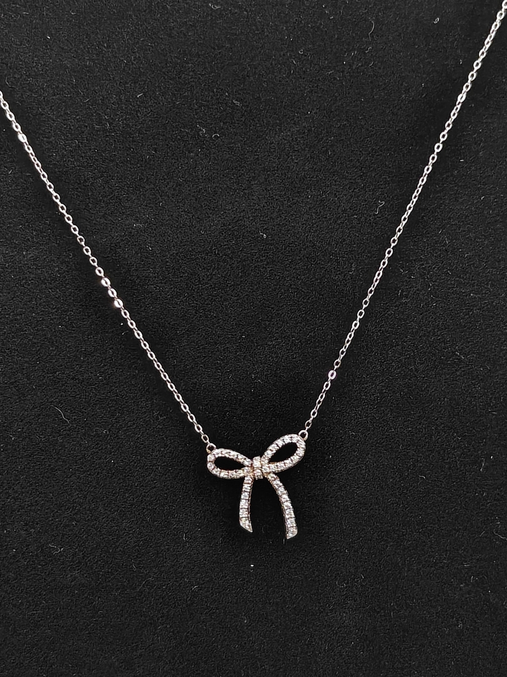 Sterling Silver Moissanite Bow Shape Necklace - Picture 2 of 6